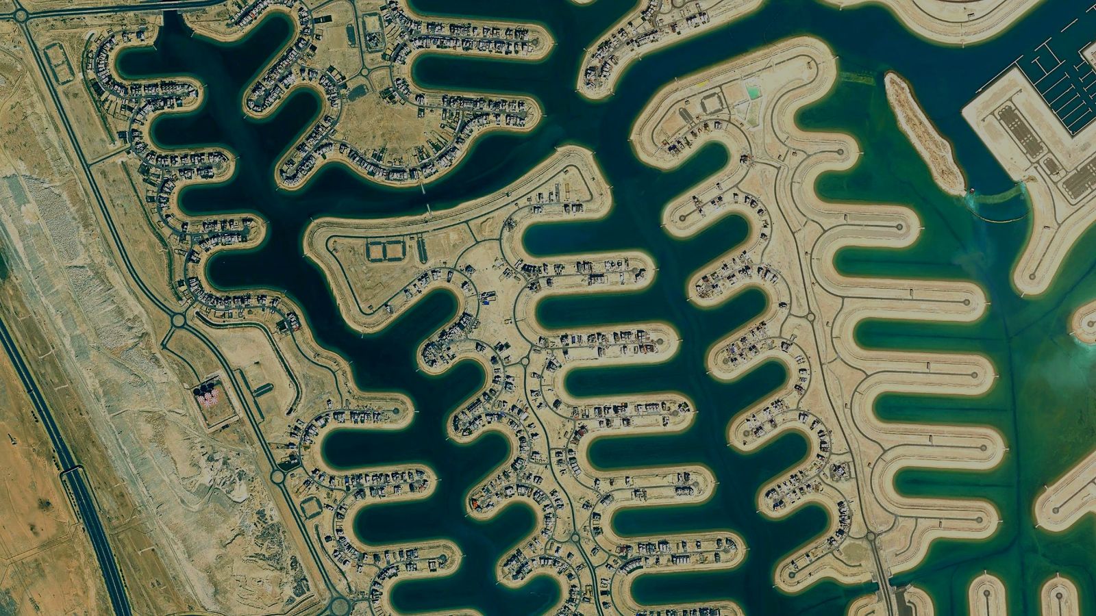 The canals of Sabah Al Ahmad Sea City seen from above