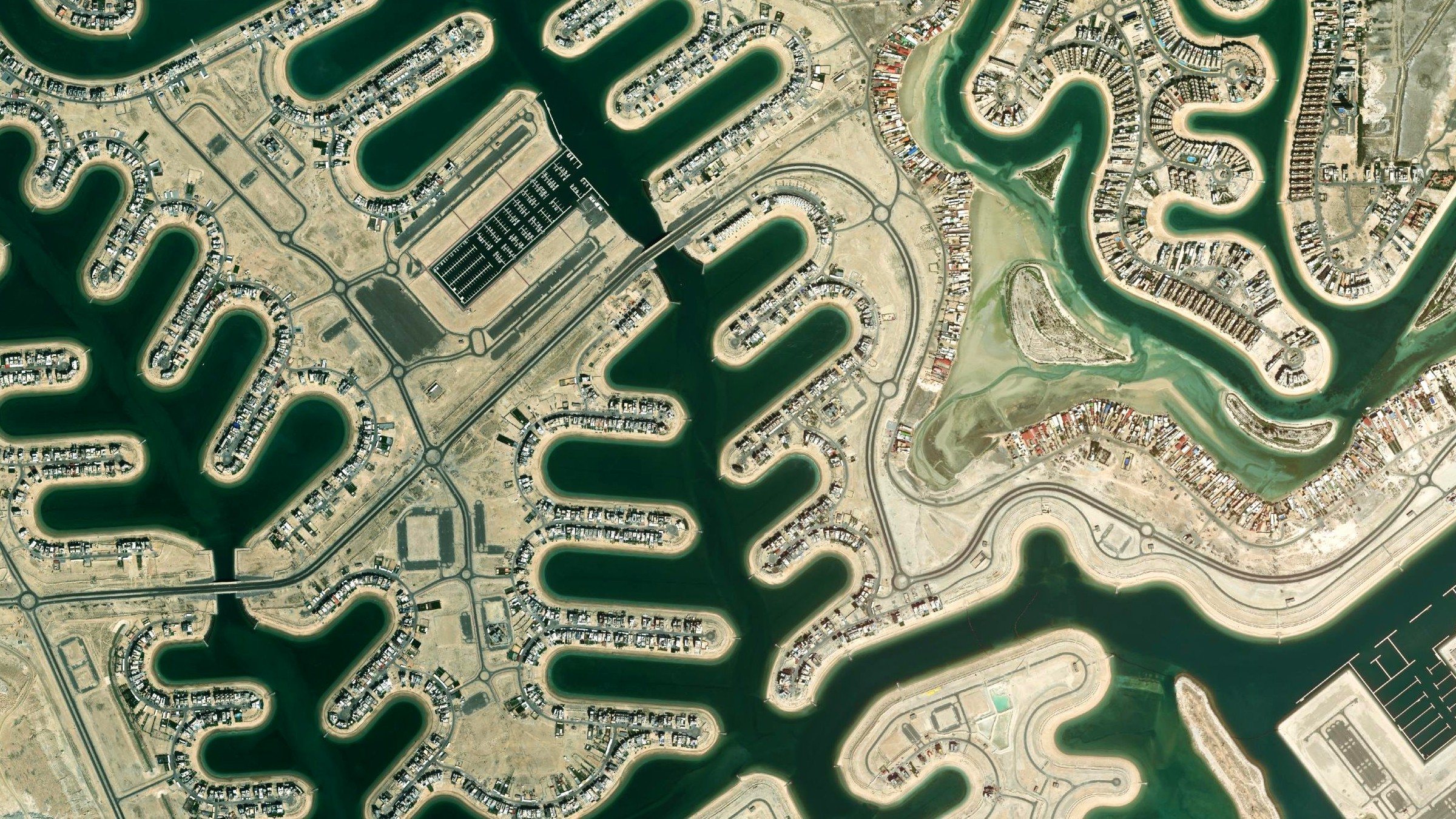 Aerial view of the canals and waterfront homes of Sabah Al Ahmad Sea City, Al Khiran, Kuwait