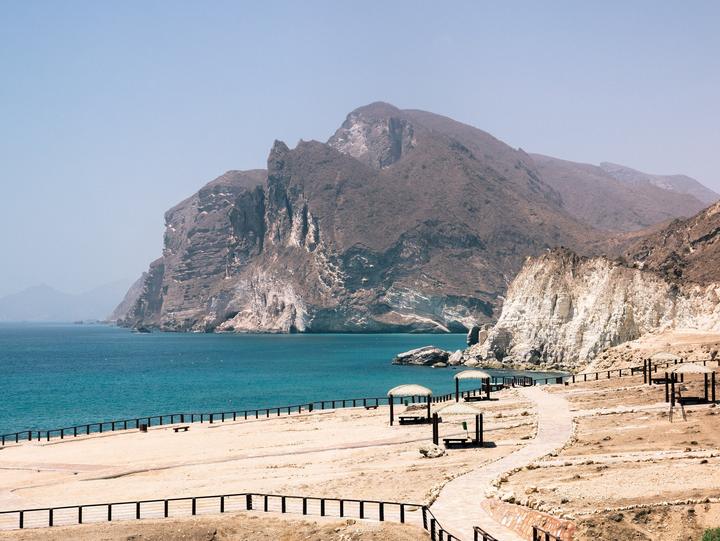 Mughsail bay with its white beach and limestone headland