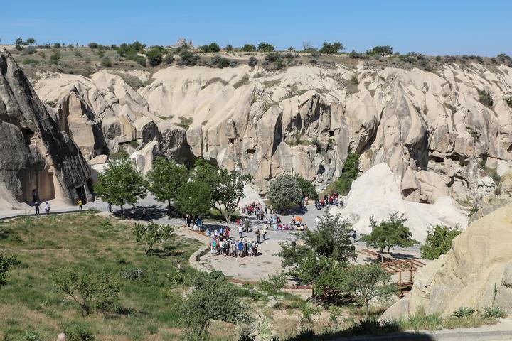Rock-cut churches and visitors at the Göreme Open Air Museum, Cappadocia
