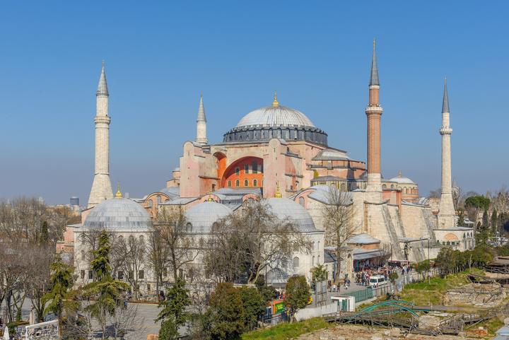 Hagia Sophia with its dome and four minarets under a clear sky, Istanbul