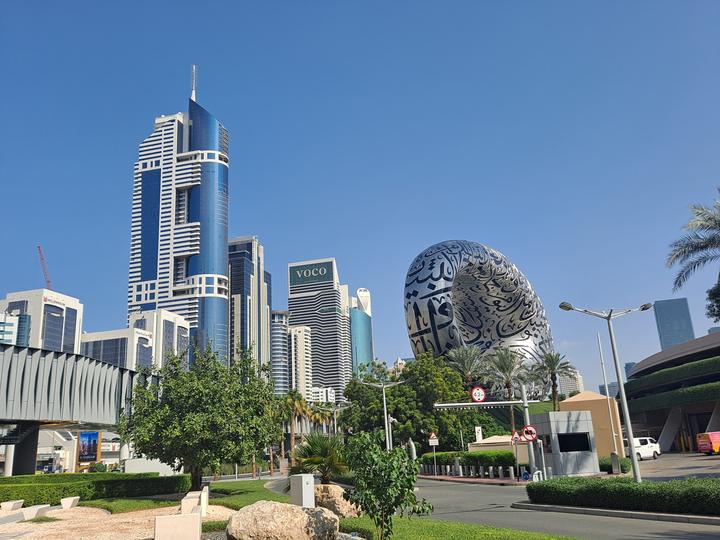 The silver ring of the Museum of the Future covered in Arabic calligraphy