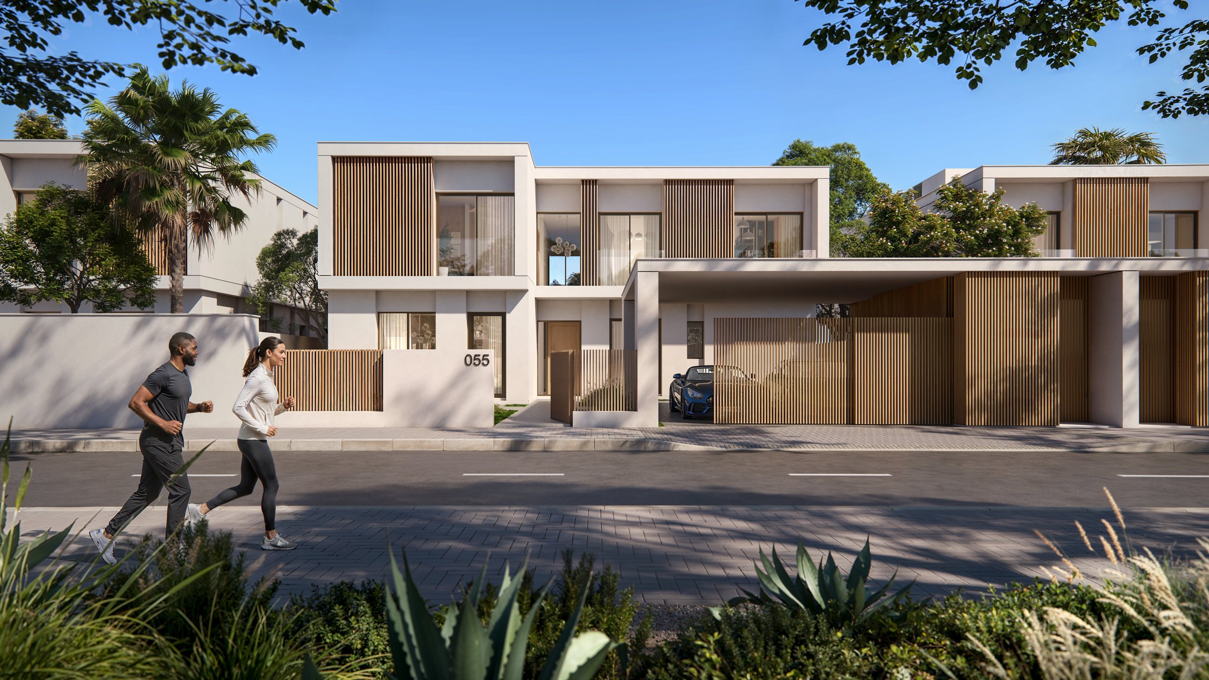 Computer-generated image of a two-storey villa with timber screens and a carport at Yas Riva Reserve, Yas Island, Abu Dhabi, with two people jogging past